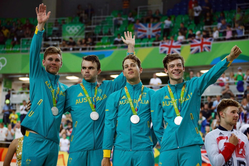 Australia's men's pursuit team with silver medals