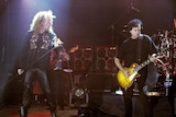 Robert Plant and Jimmy Page perform onstage
