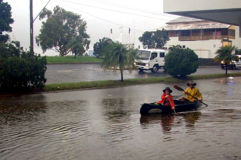 Two Mackay residents paddle down River Street