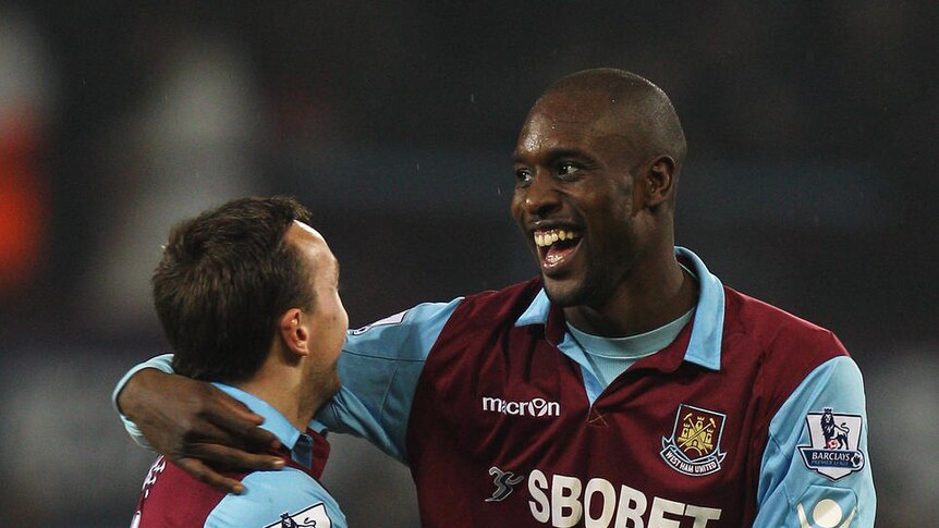 West Ham's Carlton Cole (R) who received racist Twitter messages after his team's loss to Swansea.