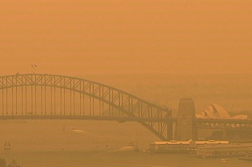 An eerie orange glow descended on Sydney Harbour late Friday afternoon.