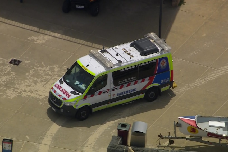 An aerial shot of a parked ambulance.