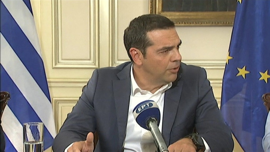 Alexis Tsipras says he is "overwhelmed by  mixed feelings right now".