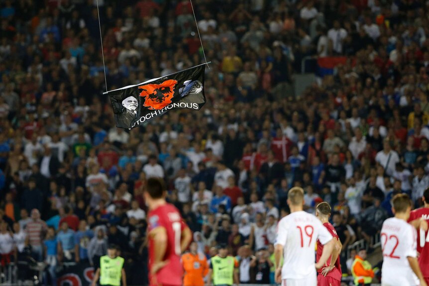 Albanian flag flown in by drone during Serbia-Albania match