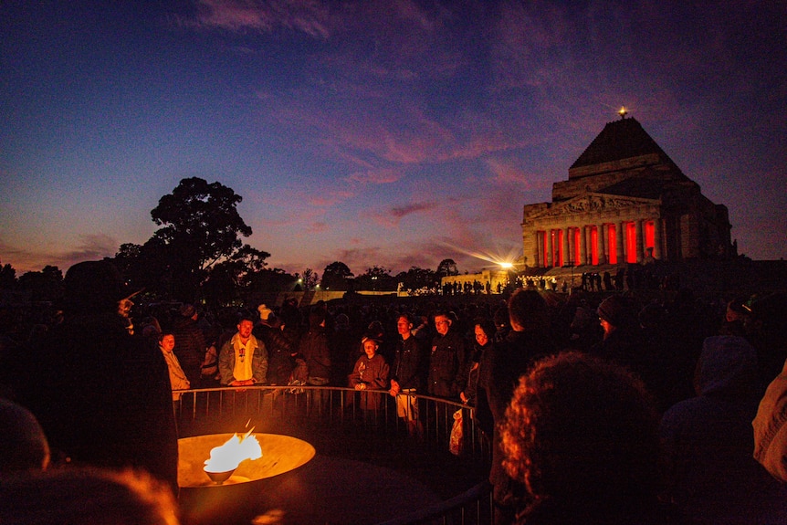 People gathered at the shrine of remembrance.