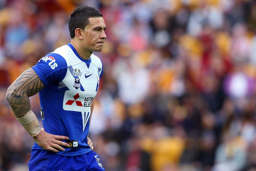 Sonny Bill Williams looks into the distance while sweating on the NRL field.