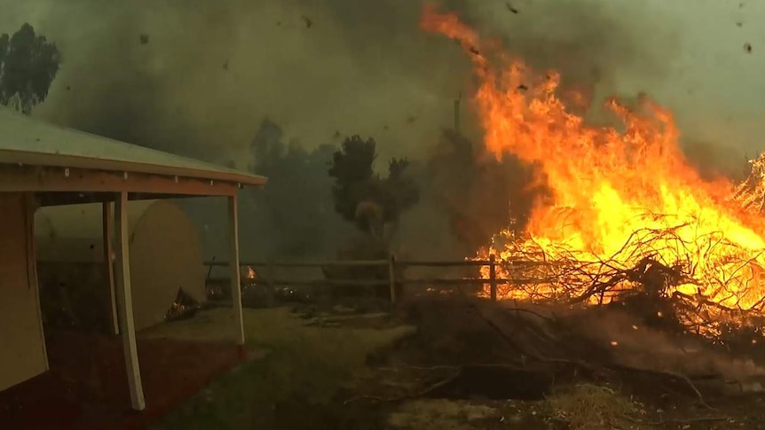 Fire encroaches on a property in WA