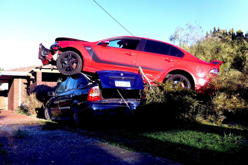 Airborne car crash lands on roof of parked car in Craigie