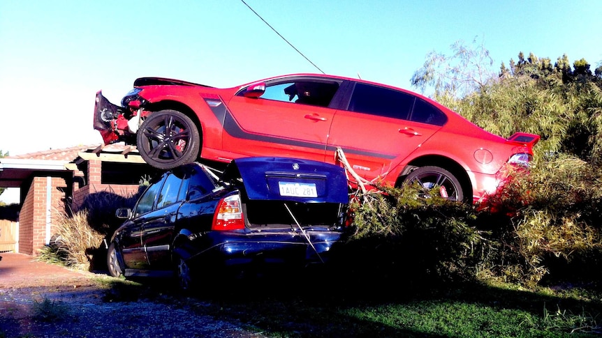Airborne car crash lands on roof of parked car in Craigie