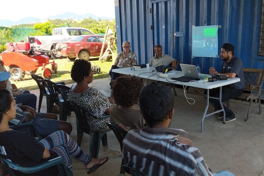 Researcher, Muhammad Esa Attia providing training and education to a group of Fijian farmers and locals
