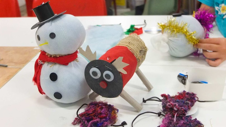 Santa and reindeer made of items from around the house.