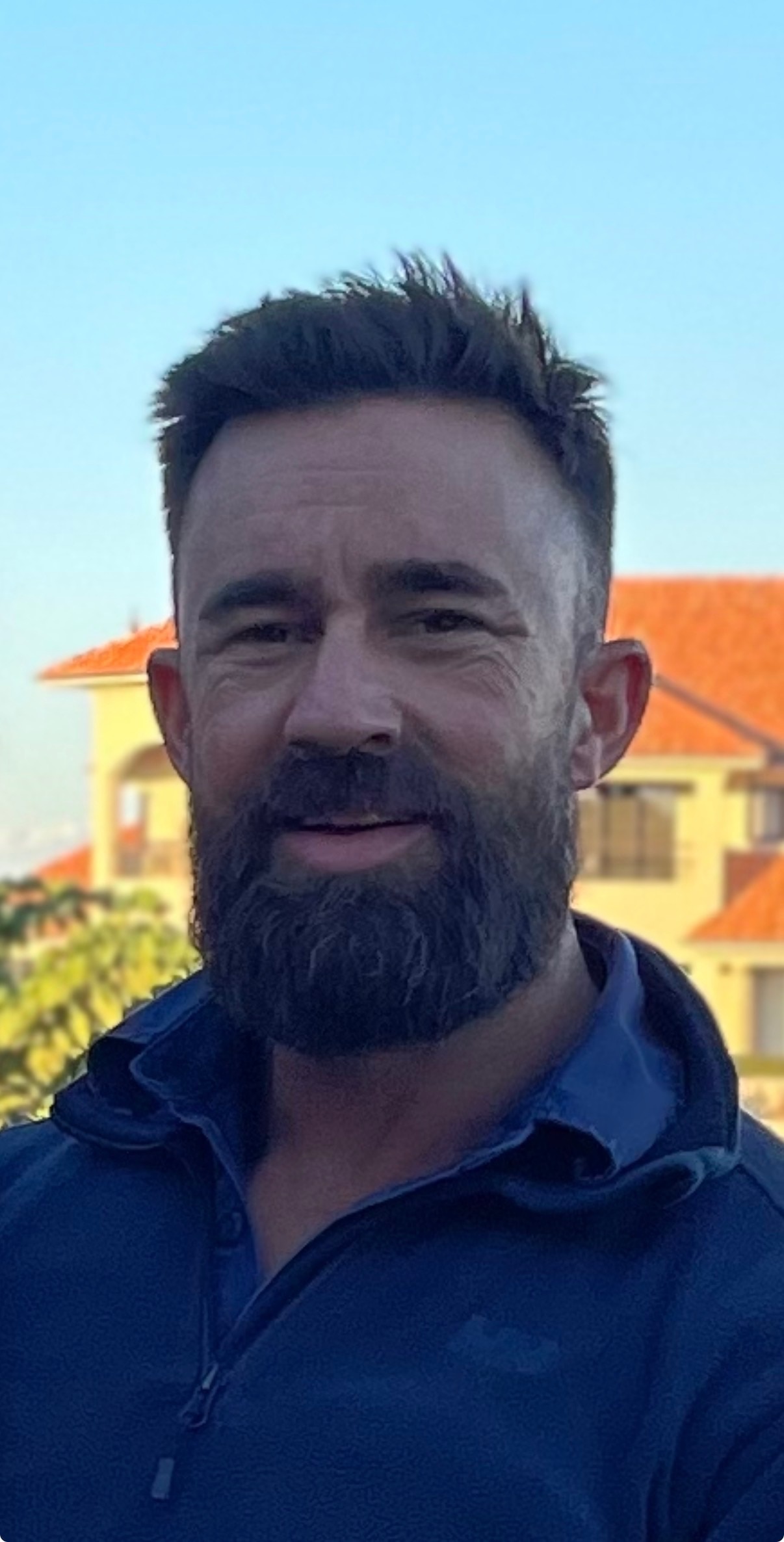 Photograph of a man with a beard