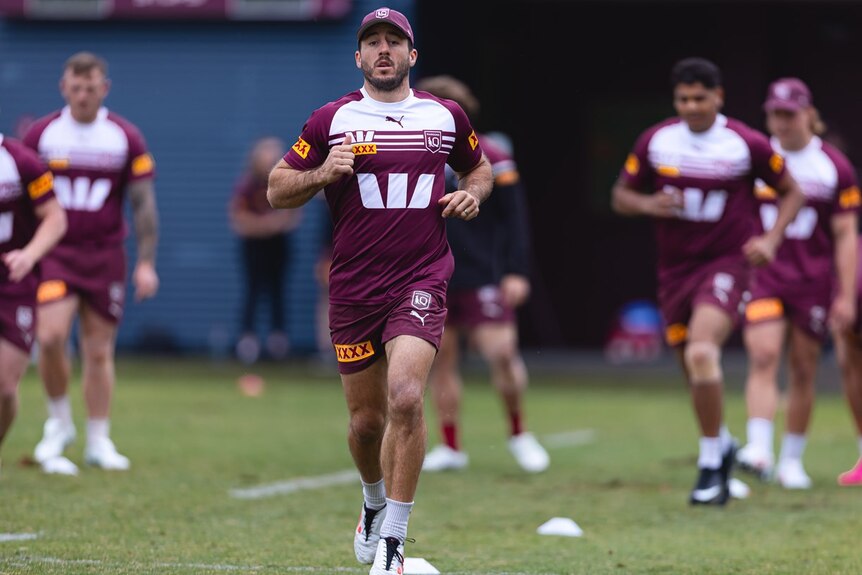 Photo of a Qld Maroons footballer training on the field