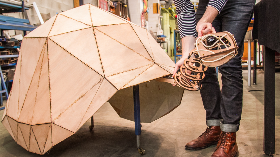 A large life-sized tortoise enables the puppeteers to move and glide with the puppet.