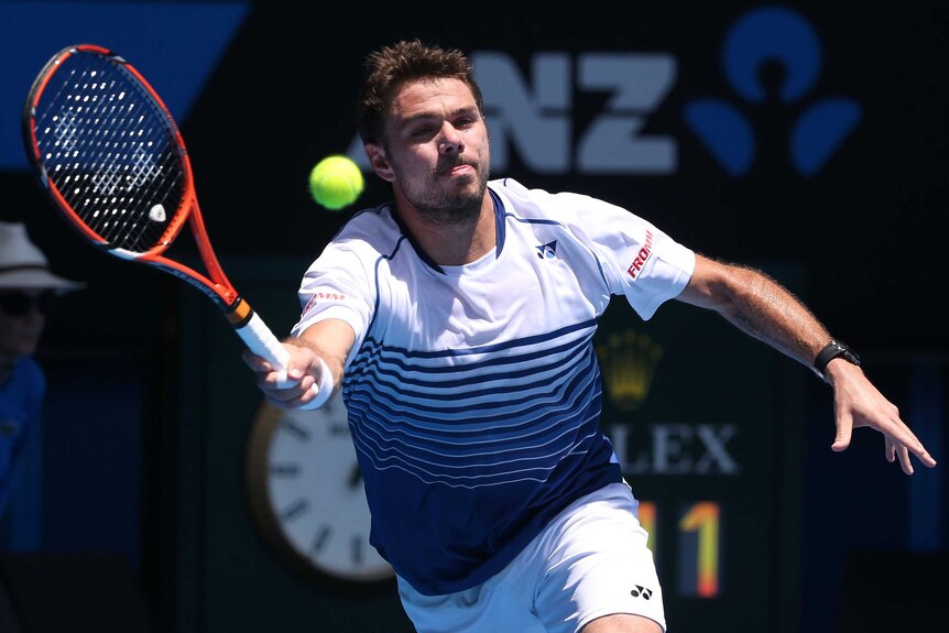 Under the pump ... Stan Wawrinka plays a forehand against Marius Copil