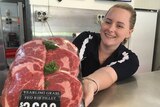 Butcher Samantha Walk displays meat on sale at her Brisbane shop, January 2019.