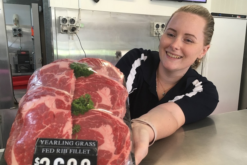 Butcher Samantha Walk displays meat on sale at her Brisbane shop, January 2019.