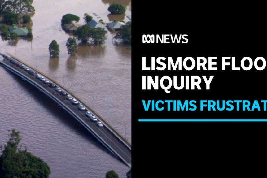Lismore Flood Inquiry, Victims Frustrated: Aerial vision of cars on a bridge which has been cut off at each end by floodwaters.