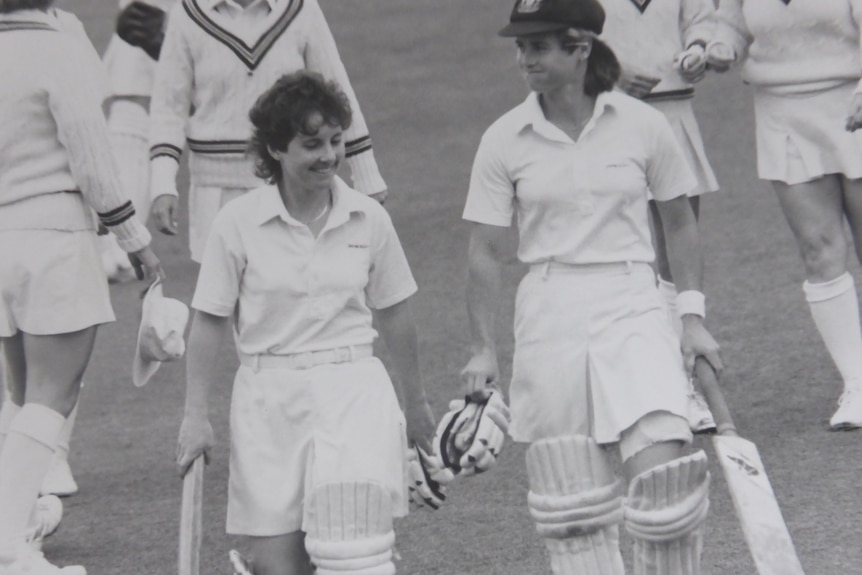 Denise Annetts and Lindsay Reeler walking off the ground.