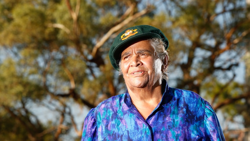 Former Australian Test cricketer Aunty Faith Thomas wearing her baggy green.