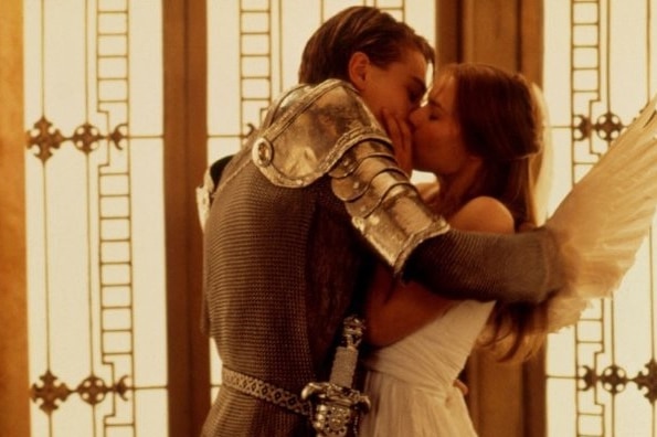 A still from 1996 Baz Luhrmann film Romeo + Juliet of main protagonists kissing