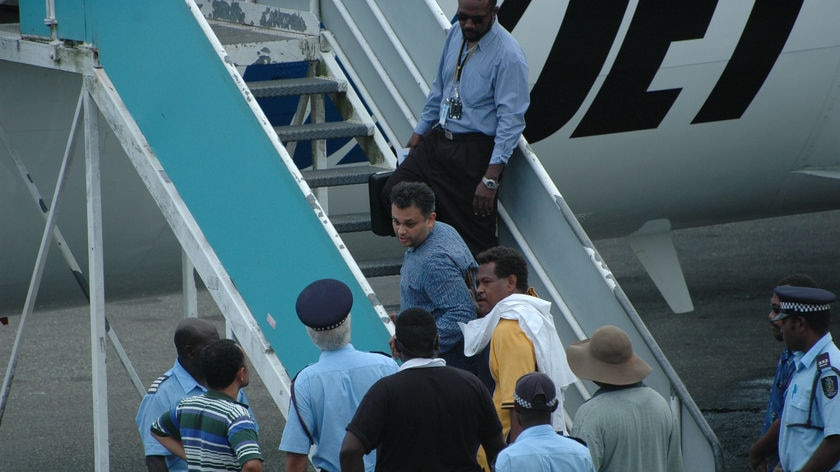 Julian Moti boards the flight which took him from Honiara to Brisbane, December 27, 2007. (File photo)