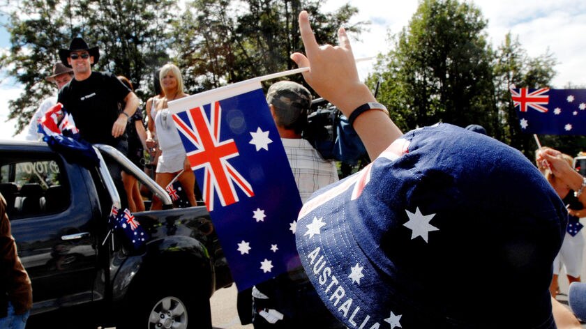 A fan waves to Australian country musician Lee Kernaghan at the Country Music Cavalcade
