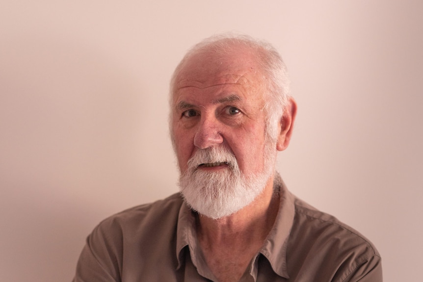 Closeup of a man with a beard.