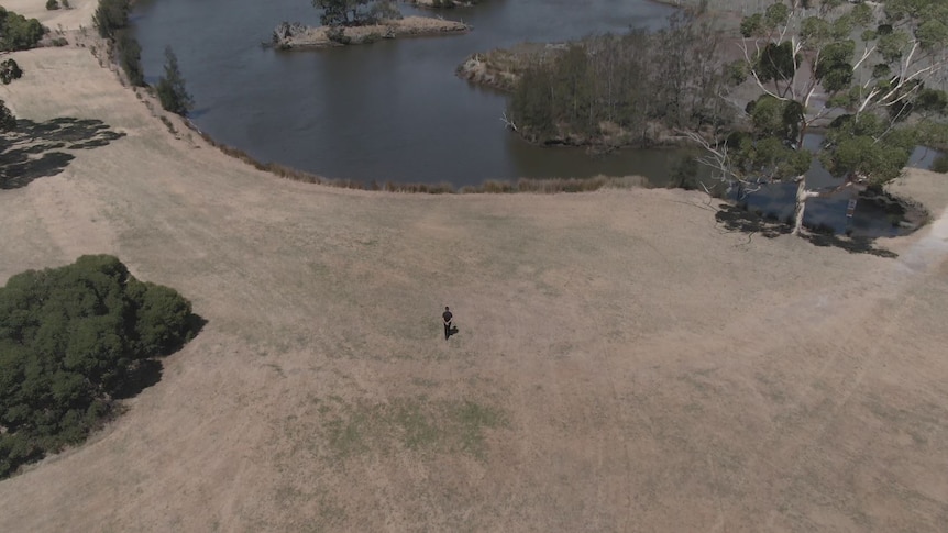 An aerial shot of the island looking very dry