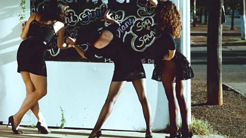 Prostitutes standing outside a Kalgoorlie brothel.