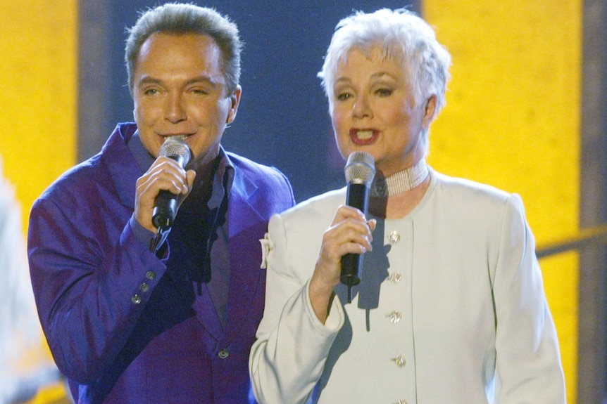 David Cassidy and Shirley Jones singing on stage in 2003.