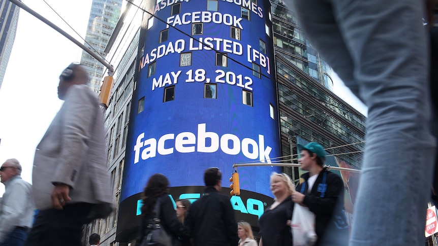 The Nasdaq board in Times Square advertises Facebook which has debuted on the Nasdaq Stock Market.