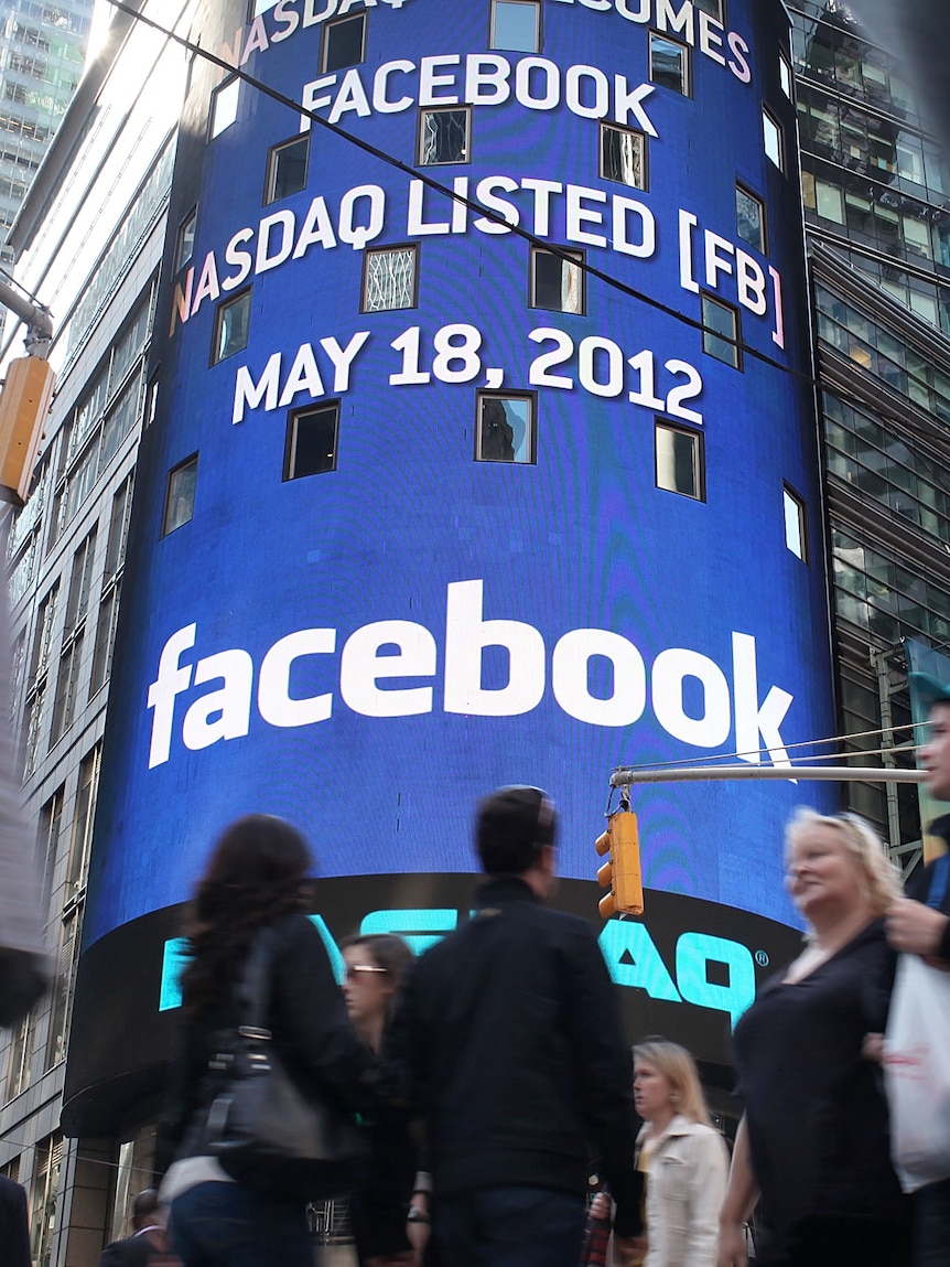 The Nasdaq board in Times Square advertises Facebook which has debuted on the Nasdaq Stock Market.