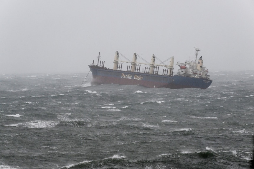 A ship in choppy sea waters
