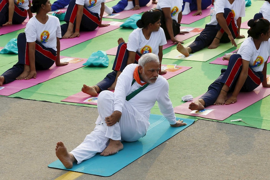 India's prime minister Narendra Modi participates in a yoga session