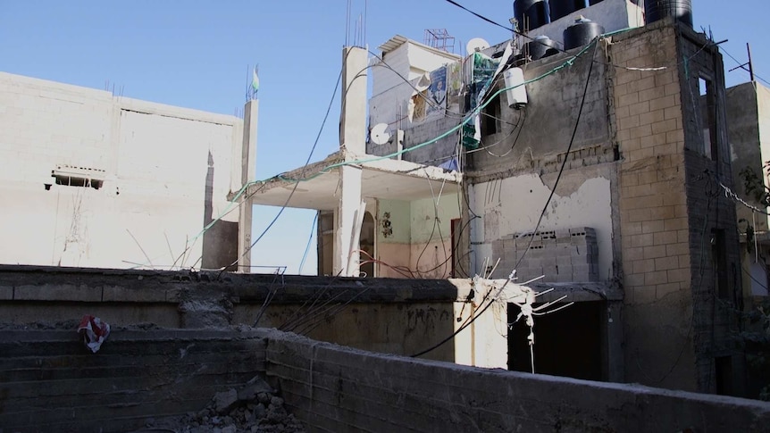 The destroyed home belonging to the family of alleged Hamas member Ibrahim al-Akari