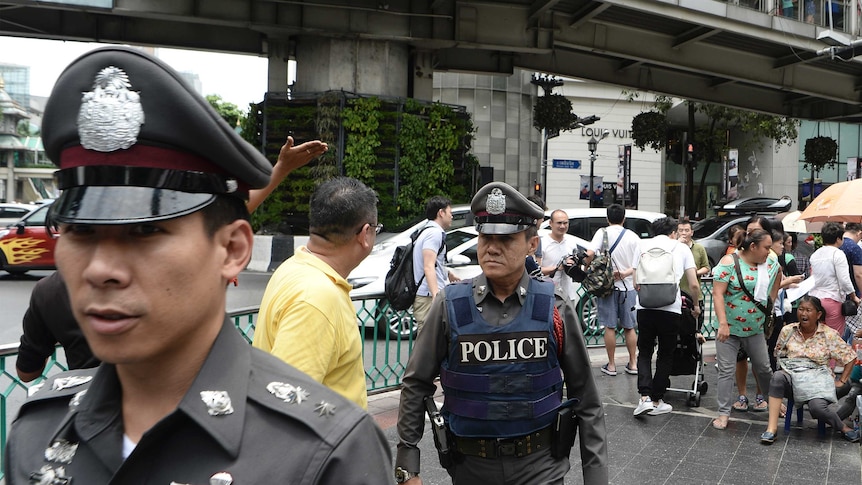 Thai police on patrol as authorities increase security following a new string of bomb attacks in Thailand.