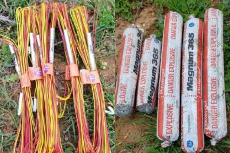 Red and yellow detonation cables and explosive materials