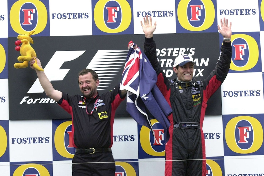 Mark Webber and Paul Stoddart celebrate Melbourne's 2002 Grand Prix