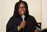 Whoopi Goldberg speaks during the Broadway at the White House event in the State Dining Room of the White House.