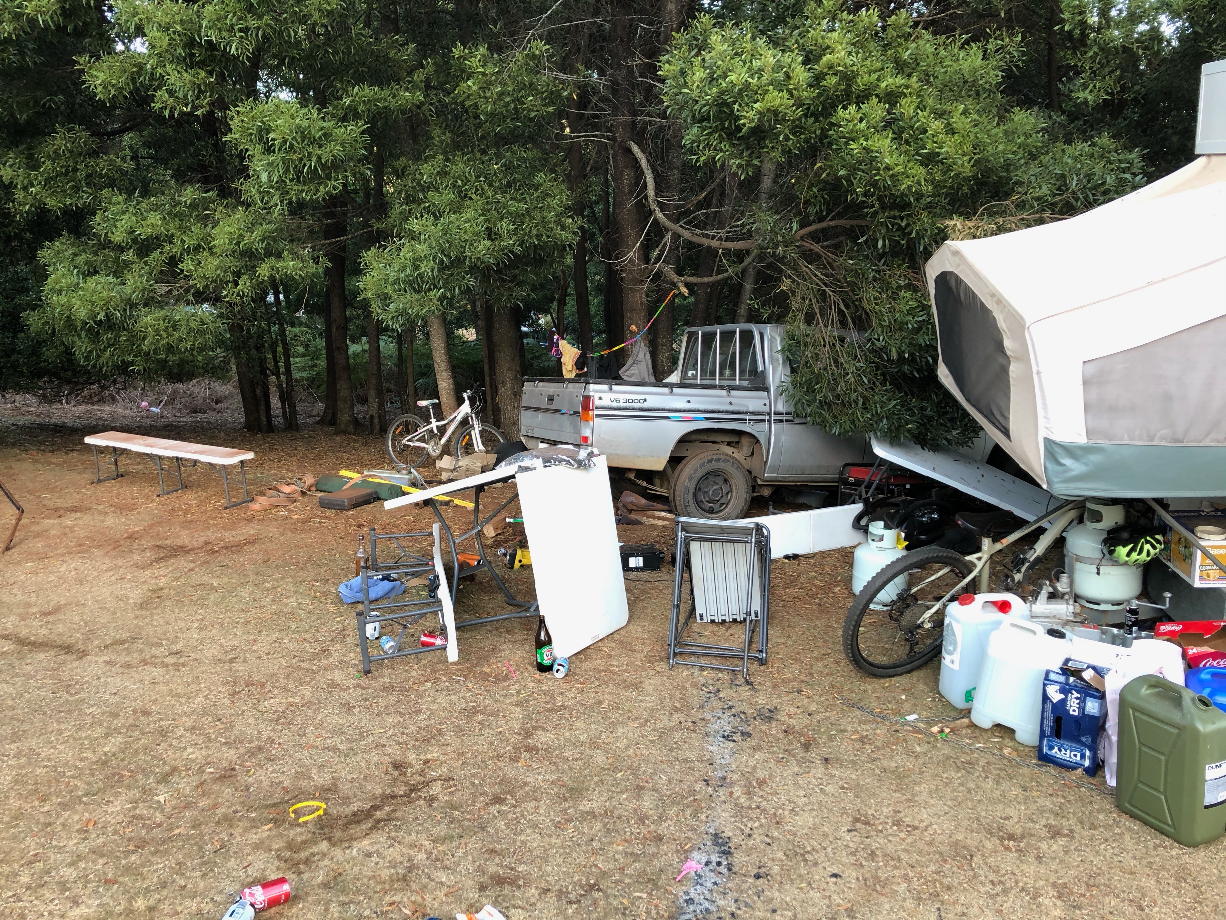 Child, 10, in hospital after man allegedly drives car through family's tent in Tasmania