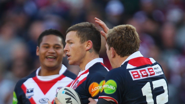 Ruling the roost...Todd Carney (c) was superb for the Roosters in their clash with Manly.