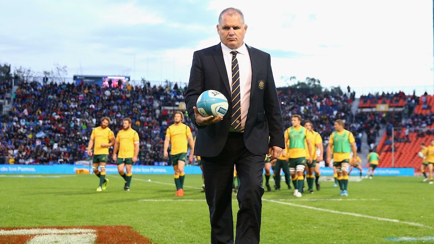 Wallabies coach Ewen McKenzie walks off the pitch before the Argentina v Australia match in Mendoza.