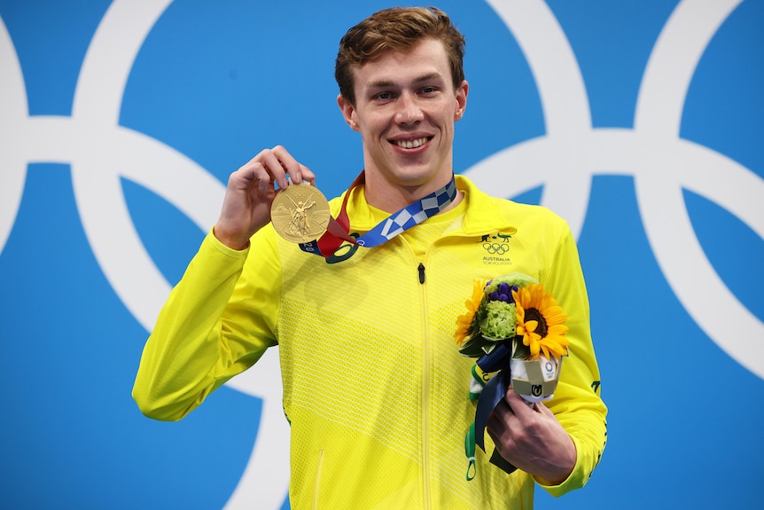 Izaac Stubblety-Cook celebrates with his gold medal