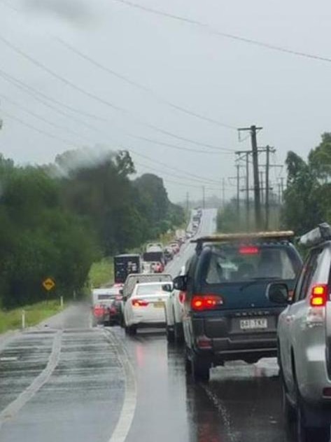 Traffic at Ravensworth in the New South Wales Hunter region during a thunderstorm.