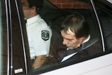 Snowtown accomplice Mark Ray Haydon in a car being escorted from court.
