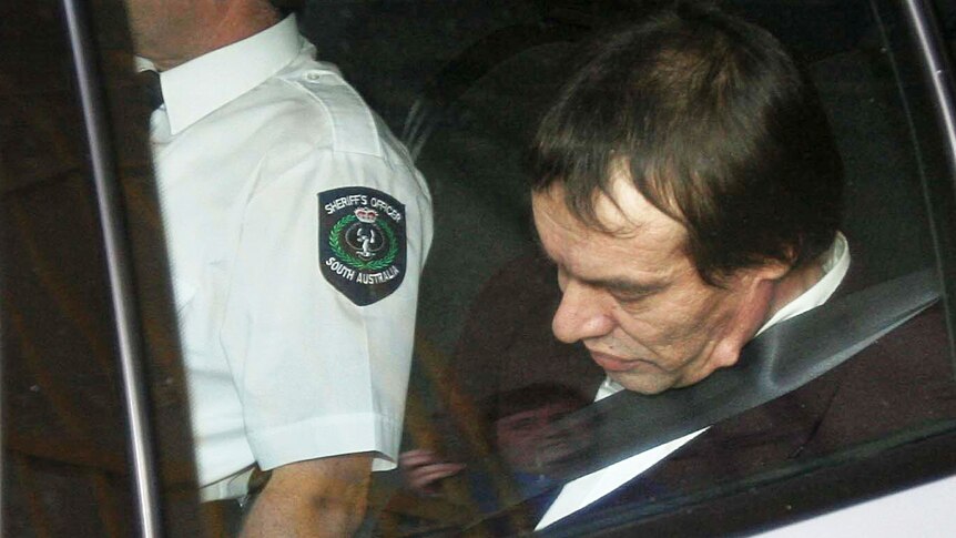 Snowtown accomplice Mark Ray Haydon in a car being escorted from court.