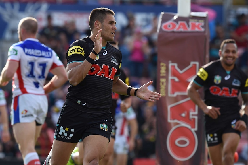 Penrith full-back Will Smith touches down against the Knights