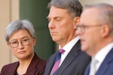 Penny Wong, Richard Marles and Anthony Albanese at a press conference 