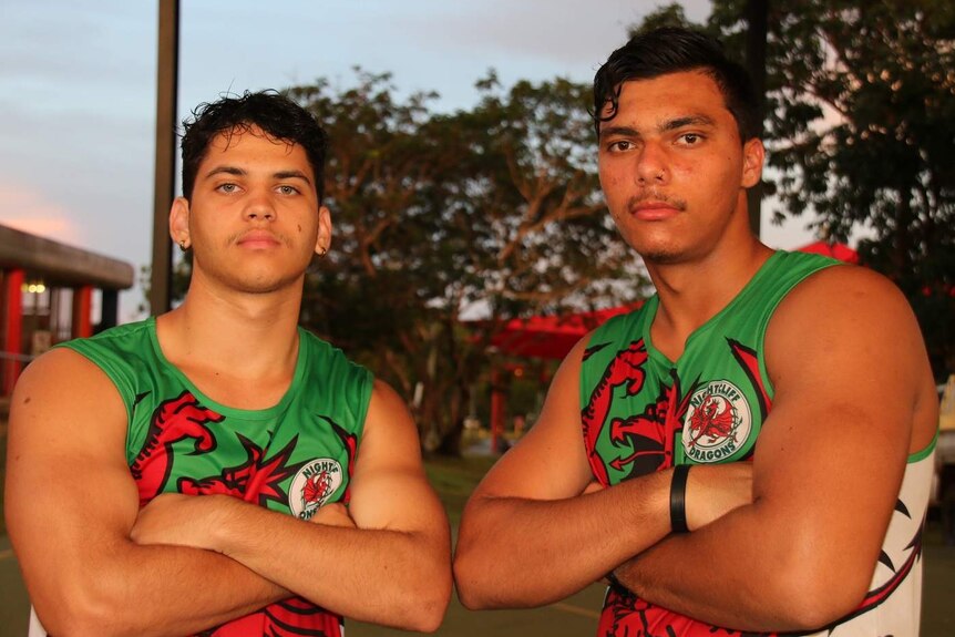 Two rugby players Sabastian Page and Shane Draper kitted up in their singlets.